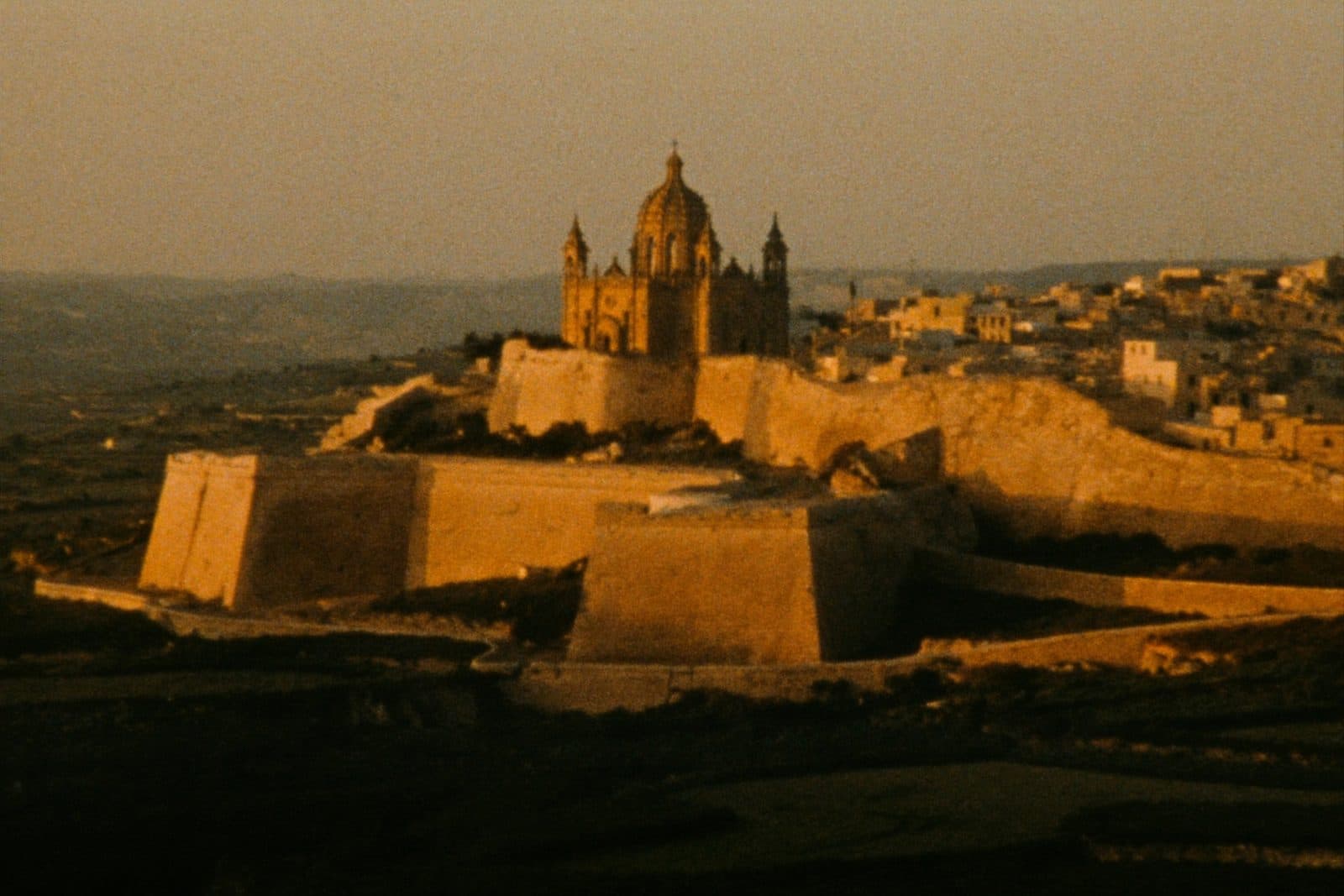 The Cittadella hilltop citadel above Victoria (Rabat), Gozo, at golden hour